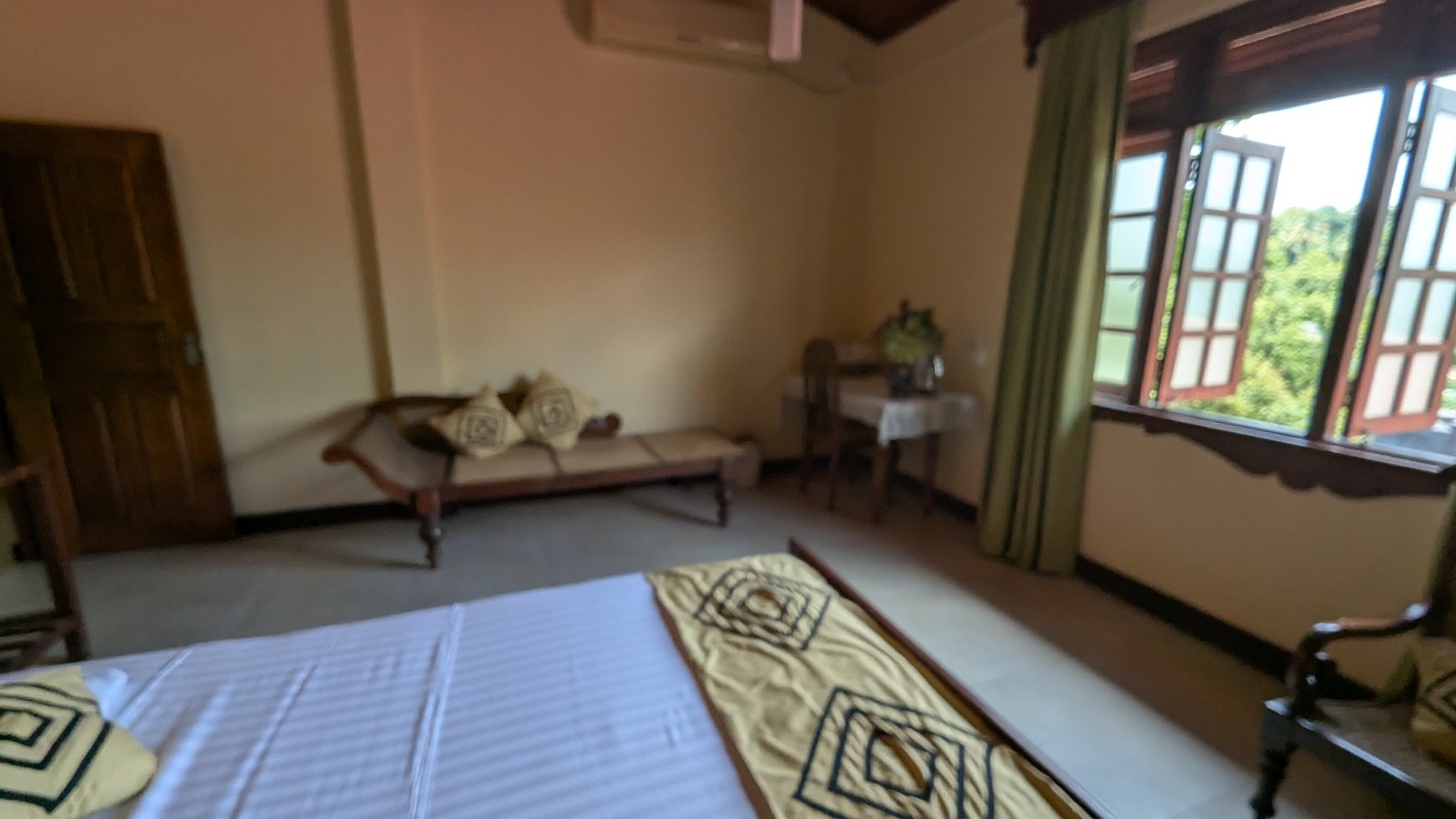 Guest bedroom with classic wooden furniture