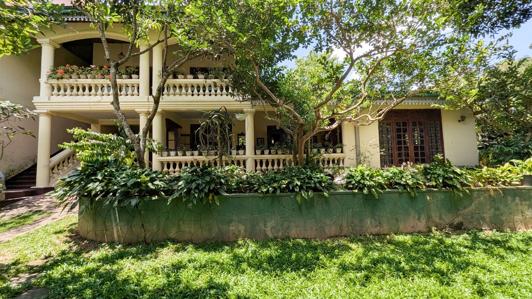 Hill Crest Residency surrounded by lush greenery
